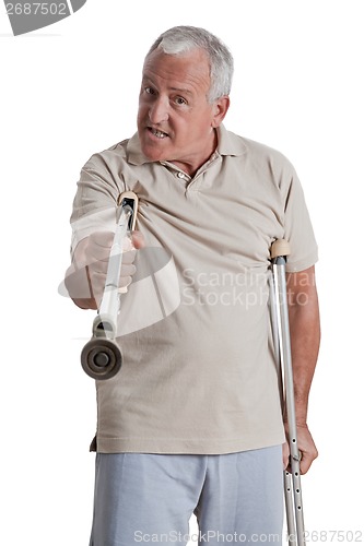 Image of Man Holding Crutch Like a Weapon
