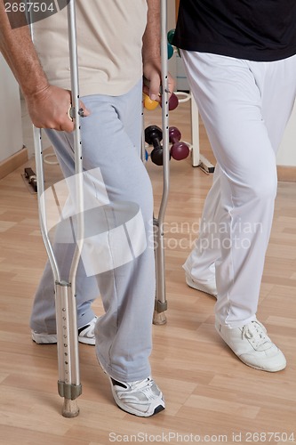 Image of Patient on Crutches and Physician