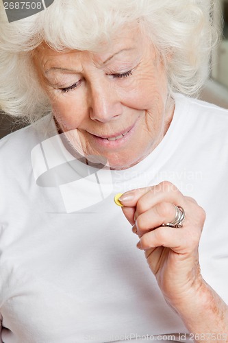 Image of Woman Holding Tablet