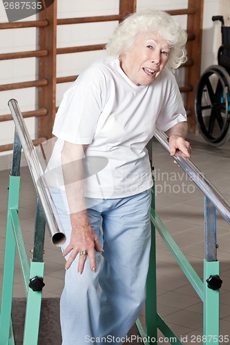 Image of Senior Woman having ambulatory therapy