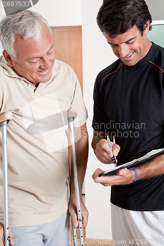 Image of Patient on Crutches and Physician