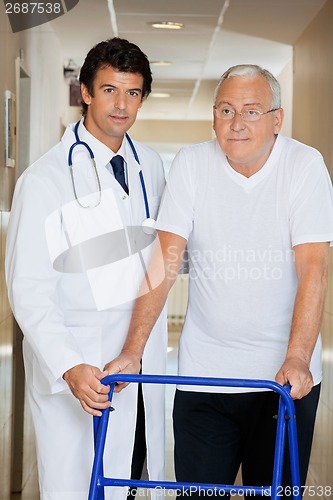 Image of Doctor Helping An Old Man With His Walker