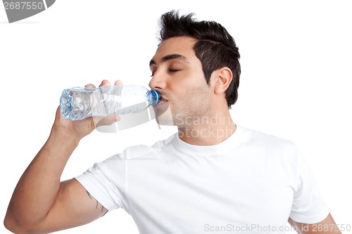 Image of Man Drinking Water from Bottle