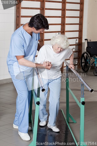 Image of Doctor helping Patient