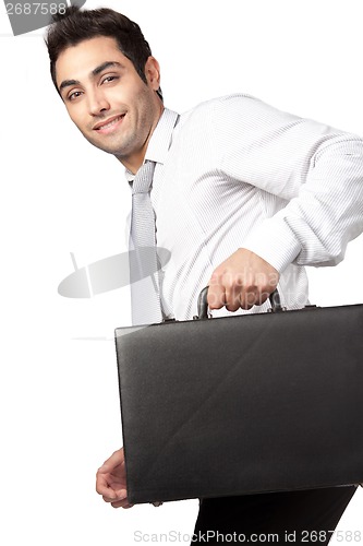 Image of Young Businessman Holding Suitcase