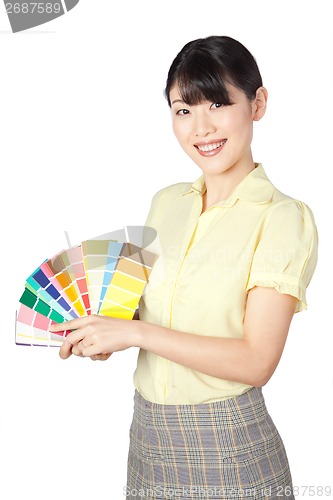 Image of Young Woman Showing Color Chart