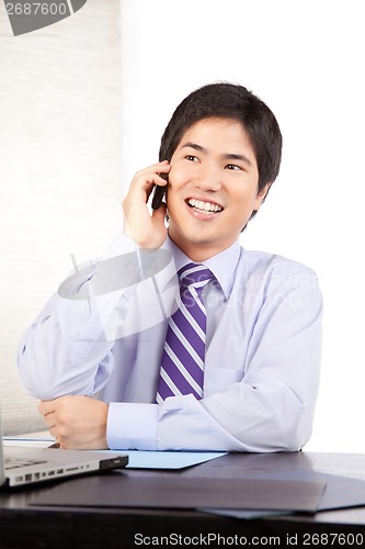 Image of Businessman Talking on Cell Phone
