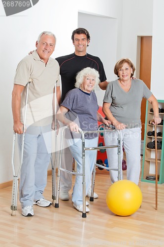 Image of Portrait Of Disabled Senior People With Trainer