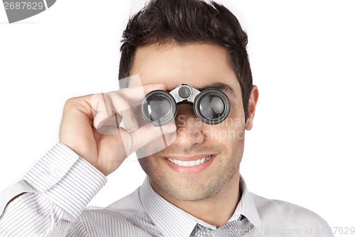 Image of Businessman Looking Through Binocular