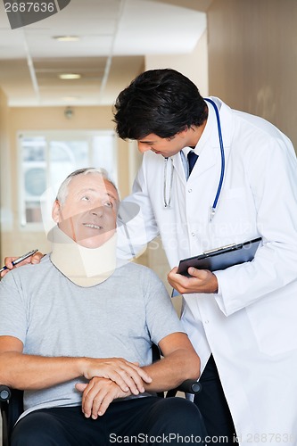 Image of Friendly Doctor With Patient