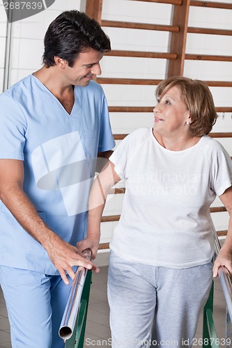 Image of Mature Woman having ambulatory therapy