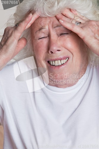 Image of Senior Woman having Headache