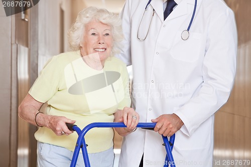 Image of Doctor and Woman with Zimmerframe