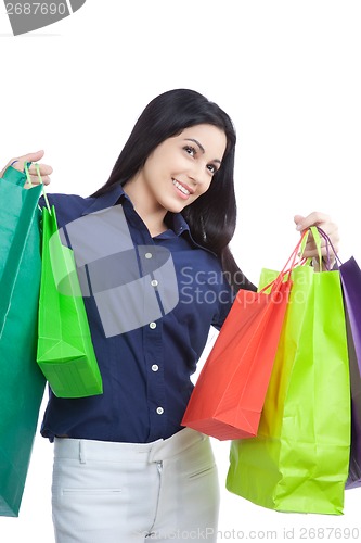 Image of Happy Woman Holding Shopping Bags