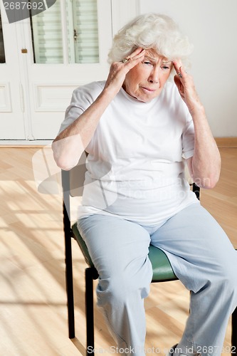 Image of Senior Woman Suffering From Headache