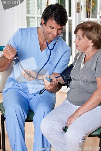 Image of Doctor taking the Blood Pressure