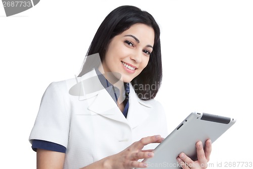 Image of Young Woman Using Digital Tablet