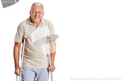 Image of Senior Man On Crutches