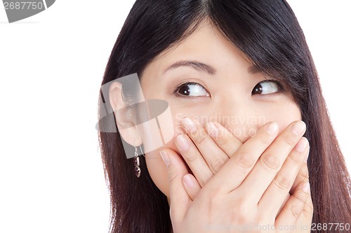 Image of Asian Woman Covering her Mouth