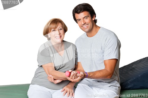 Image of Therapist Giving Muscle Training For Elbow Joint