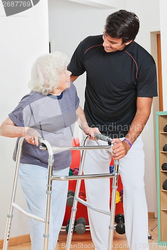 Image of Woman And Trainer Looking At Each Other