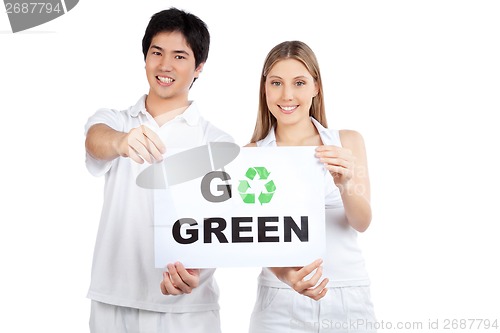 Image of Young Couple  Holding Blank Placard
