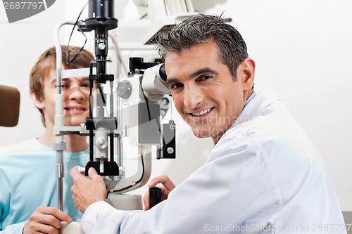 Image of Optometrist Doing Visual Field Test On His Patient