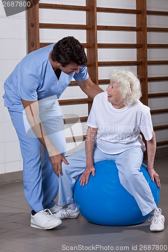 Image of Physical Therapist helping a Patient