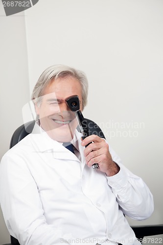 Image of Optometrist With Ophthalmoscope