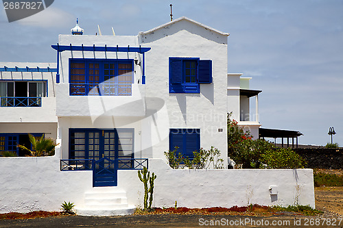 Image of house step cactus bush  rock stone sky in arrecife lanzarote  