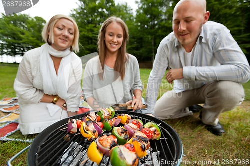 Image of Kebabs on Portable Barbecue