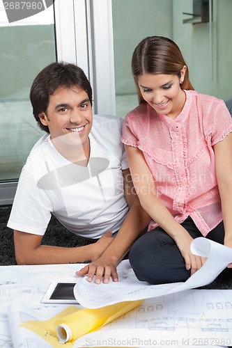 Image of Couple With House Plans