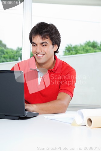 Image of Man Using Laptop