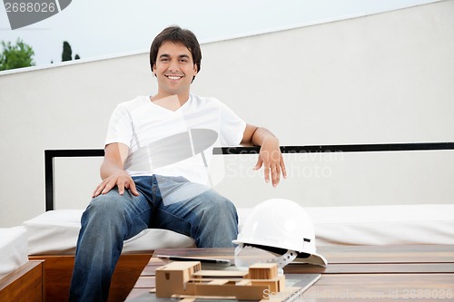 Image of Relaxed Young Male Architect