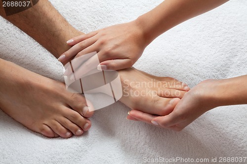 Image of Hands Massaging Feet