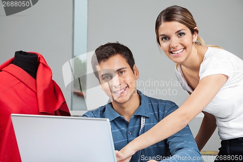 Image of Designers Working On Laptop