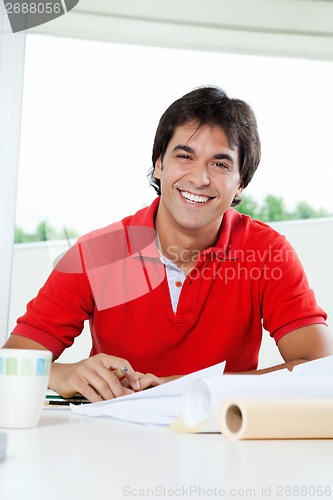 Image of Happy Architect Working From Home