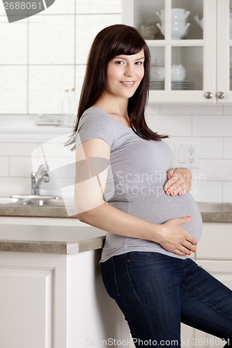 Image of Pregnant Portrait in Kitchen