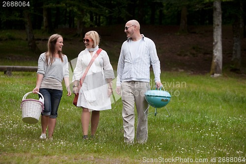 Image of Friends in Park Ready for BBQ