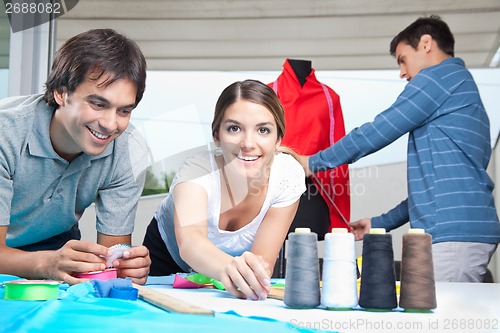 Image of Fashion Designers Working Together