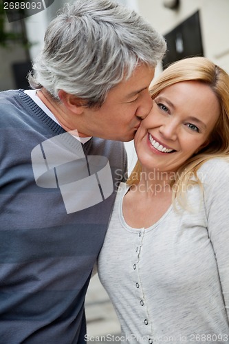 Image of Man Kissing Woman