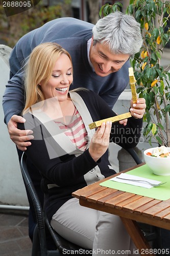 Image of Happy Woman With Present