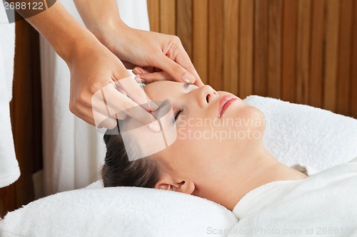 Image of Female Receiving Head Massage At Spa