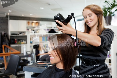 Image of Blow Drying Hair After Haircut