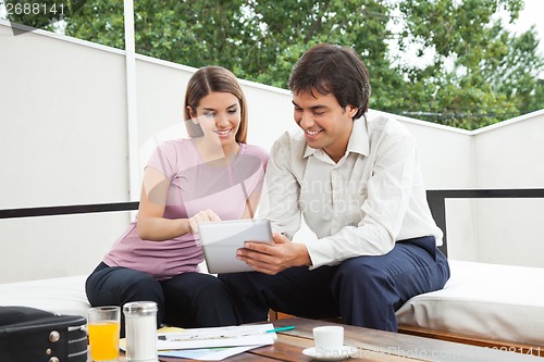 Image of Architect Discussing With Female Client