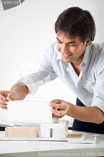 Image of Architect Creating a Model House