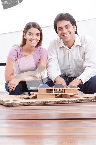 Image of Two Architects with House Model