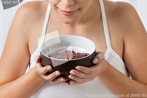 Image of Woman With Bowl Of Kidney Beans