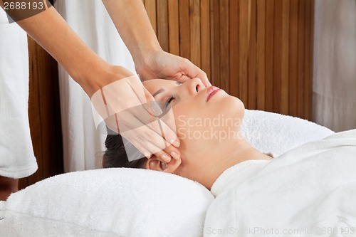 Image of Woman Receiving Head Massage At Spa