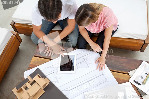 Image of Couple With House Plans